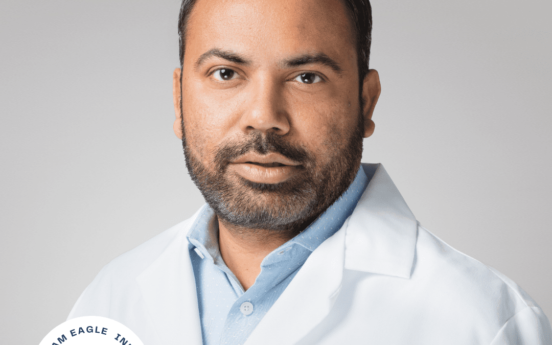 Text reads, "Welcome to the Team Eagle Industry Expert Jay Patel, Ph.D., Director of Chemistry." Dr. Patel is smiling while wearing a white Eagle branded lab coat.